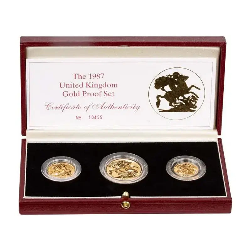 1987 Gold Proof 3-Coin Sovereign Set in original Royal Mint presentation case, featuring a double sovereign, full sovereign, and half sovereign with a proof finish.